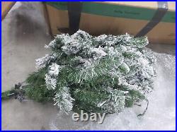 Sterling 6.5 ft. Natural Cut Narrow Christmas Tree with 200 Clear Lights Green
