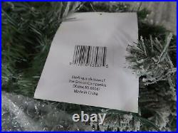 Sterling 6.5 ft. Natural Cut Narrow Christmas Tree with 200 Clear Lights Green
