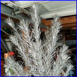 Vintage silver aluminum christmas tree 5 1\2 ft 65 branch silver tree
