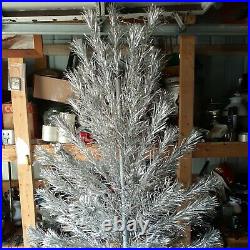 Vintage silver aluminum christmas tree 5 1\2 ft 65 branch silver tree